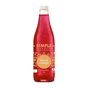 Bottle of Simple Organic blood orange juice on a white background.