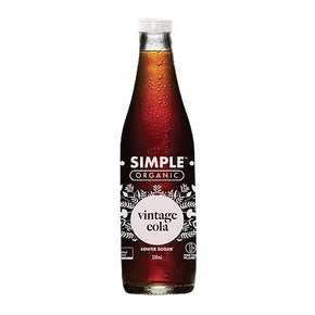 Bottle of Simple Organic vintage cola on a white background.